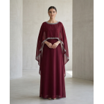 Woman wearing a deep burgundy shamoz silk maxi dress with a separate embroidered cape overlay and a floor-length A-line skirt.