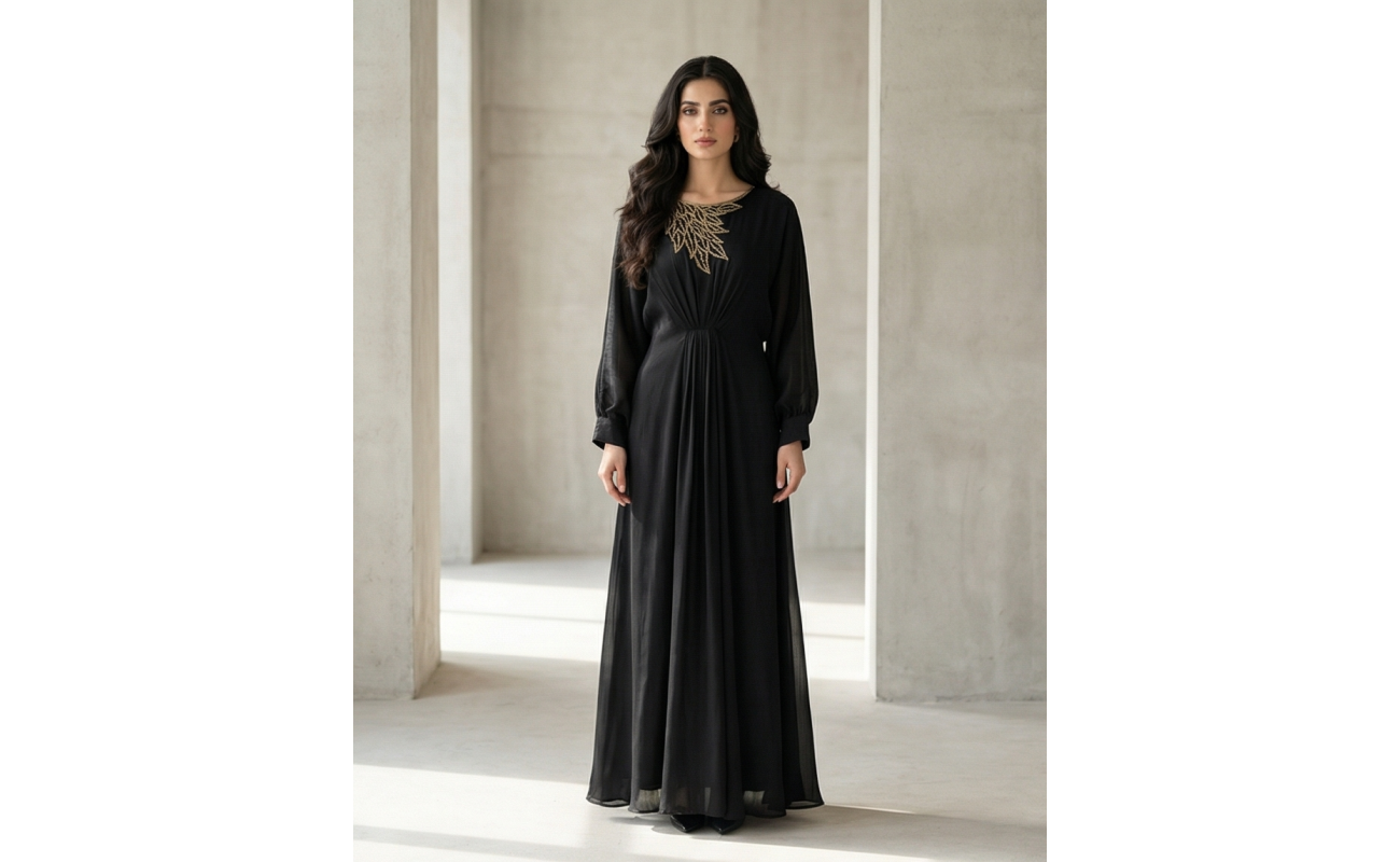 Woman modeling a two-piece coffee brown cotton lava kaftan set with a button-down collared shirt and matching floor-length skirt.