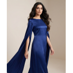 : Woman wearing a stunning royal blue shamoos silk maxi dress with dramatic long split sleeves and a boat neckline.