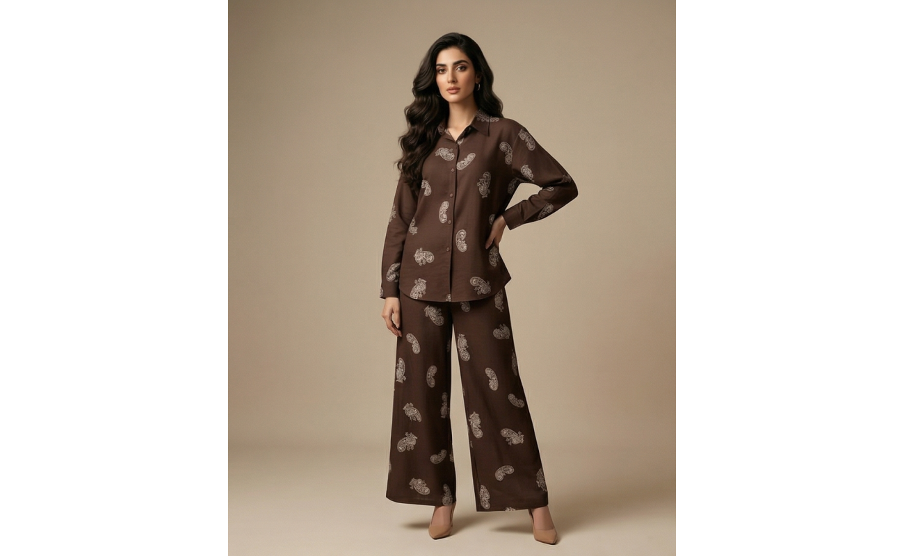 Woman wearing a white and grey paisley print Irish linen co-ords set with long sleeves